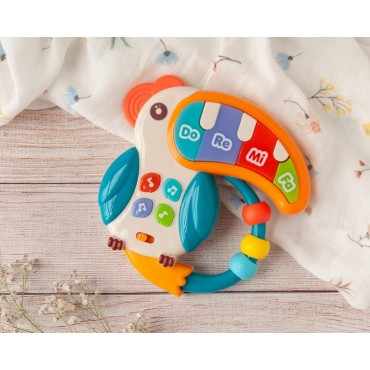 WOOPIE BABY muzikinis žaislas fortepijonas Teether Pelikan 3in1